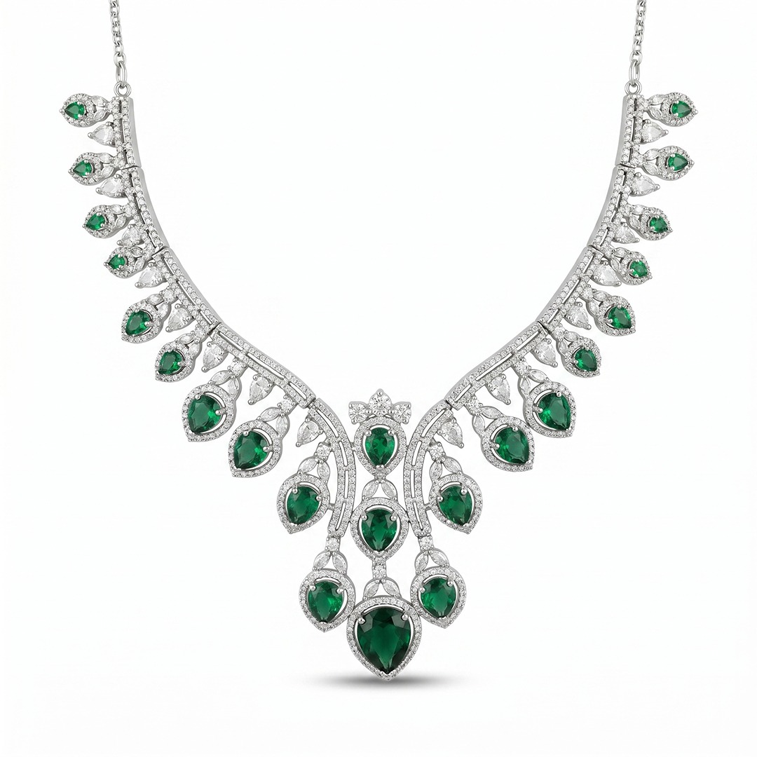 WhatsApp Image 2026-06-15 at 2.41.08 PM Royal Emerald Cascade necklace featuring pear-cut green gemstones and brilliant accents